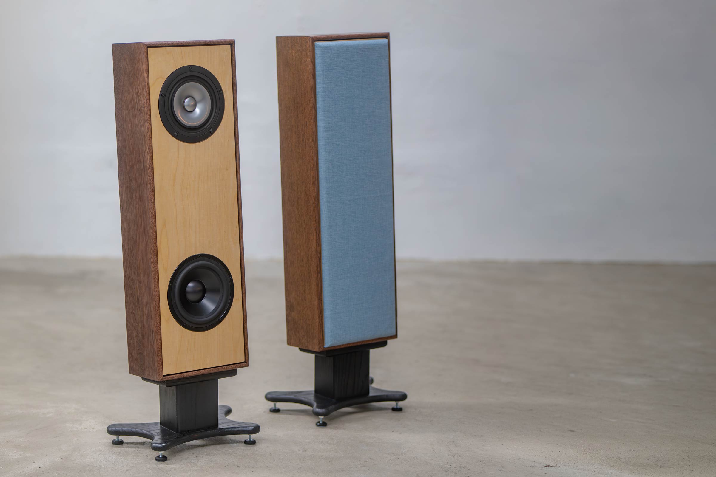 Momentae Blade loudspeaker with hardwood frame, natural baffle, and furniture-inspired detailing